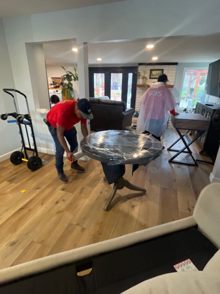 Furniture moved clear before drying begins in a Santa Ana house