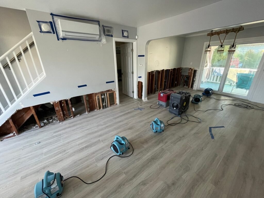 Wall opened at the base beside the stairs in a Santa Ana home