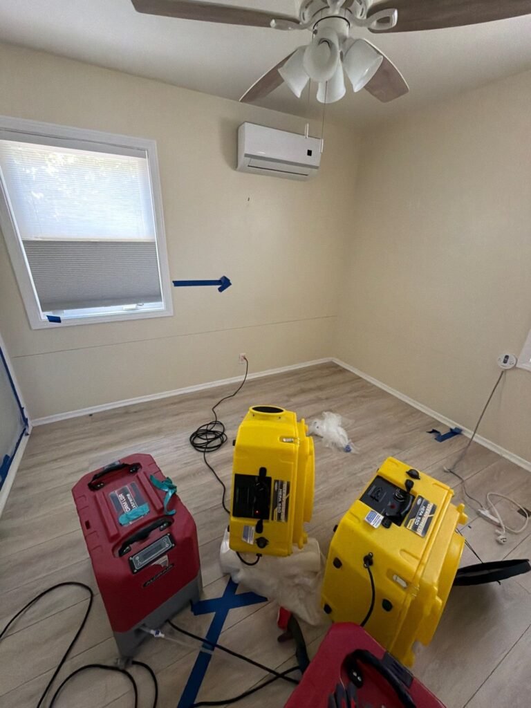 Drying equipment running in a Santa Ana living room