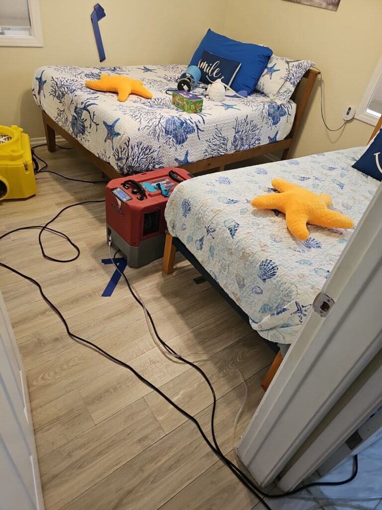 Air movers drying a Santa Ana bedroom