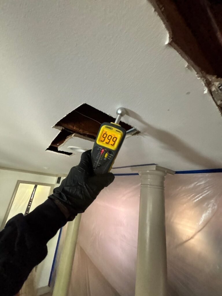 A meter pressed to an opened ceiling and pinned at 999, the top of its scale in Santa Ana